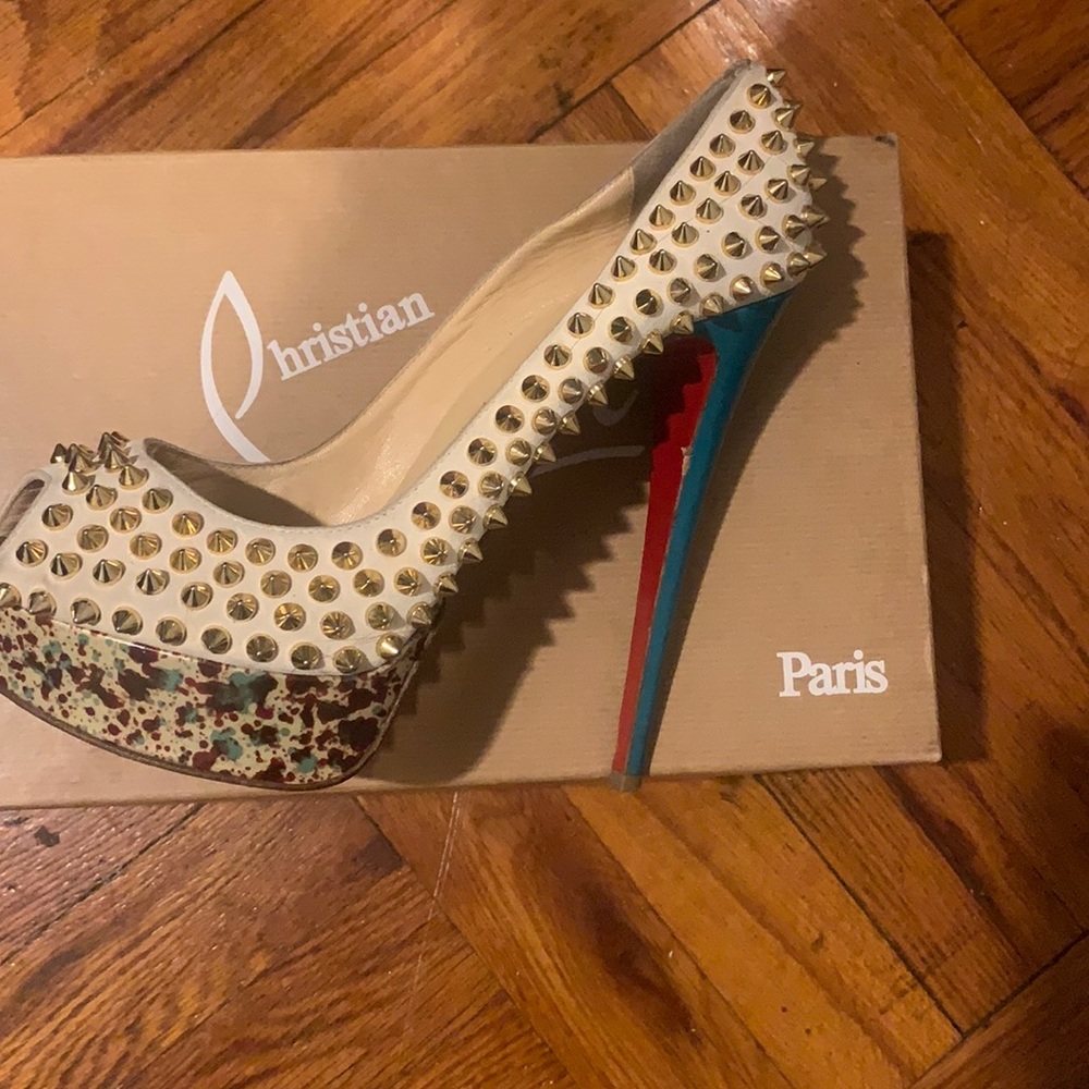 Louboutin heels with spike a splash a blue an red